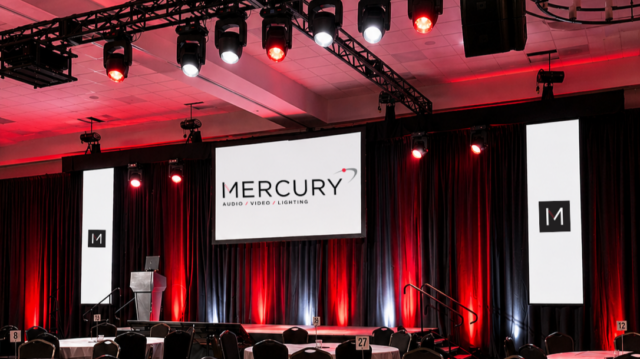 Live Corporate Event with three LED walls staging lighting and audio equiptment