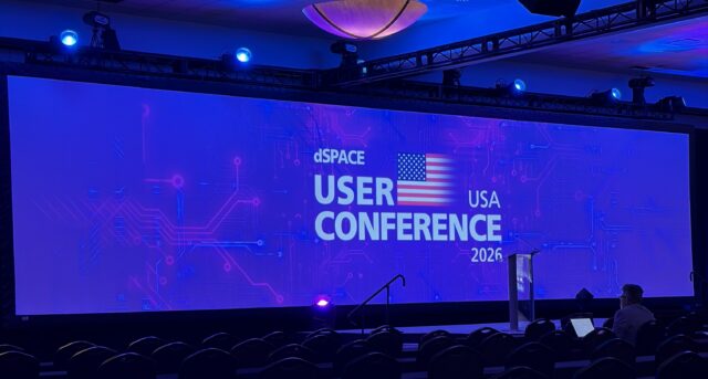large projector screen reading "dSPACE User Conference USA 2026" that Mercury Sound & Lighting set up for a corporate event