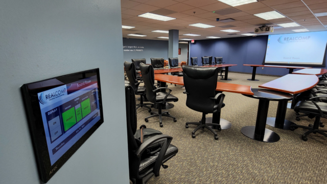 Conference Room AV with touch screen panel that controls the lighting and displays in the room